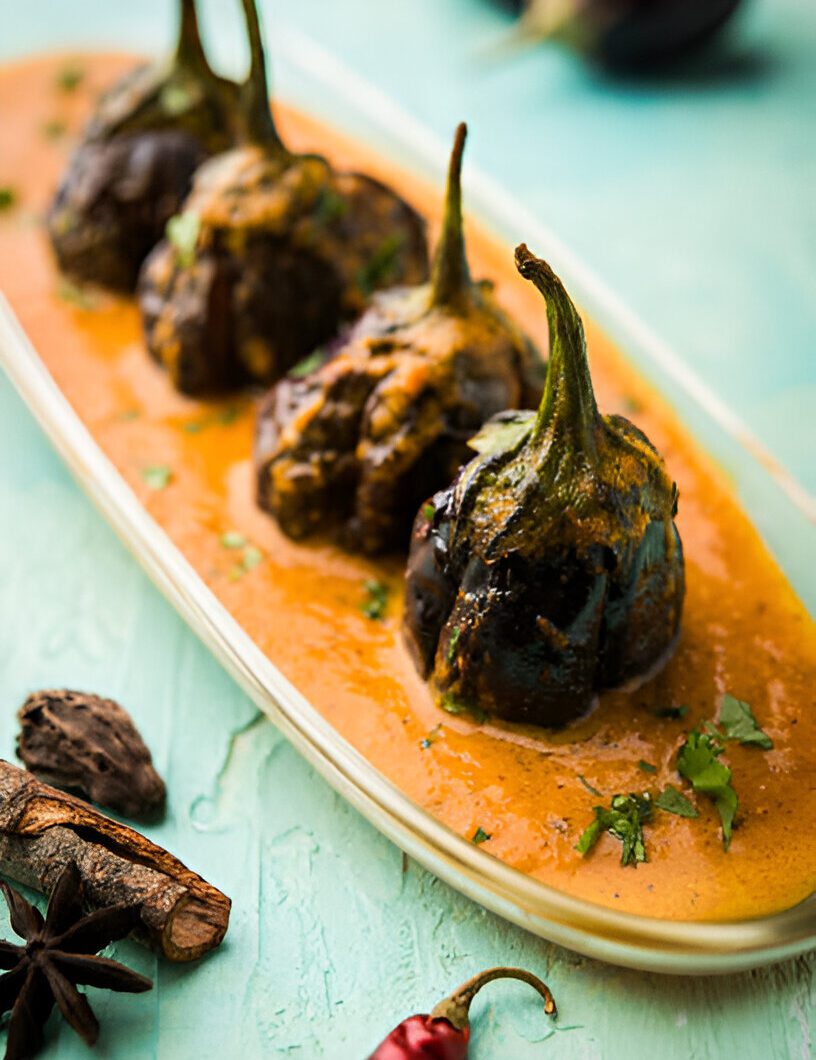 Bharli Vangi (Stuffed Baby Brinjals in Coconut Gravy)